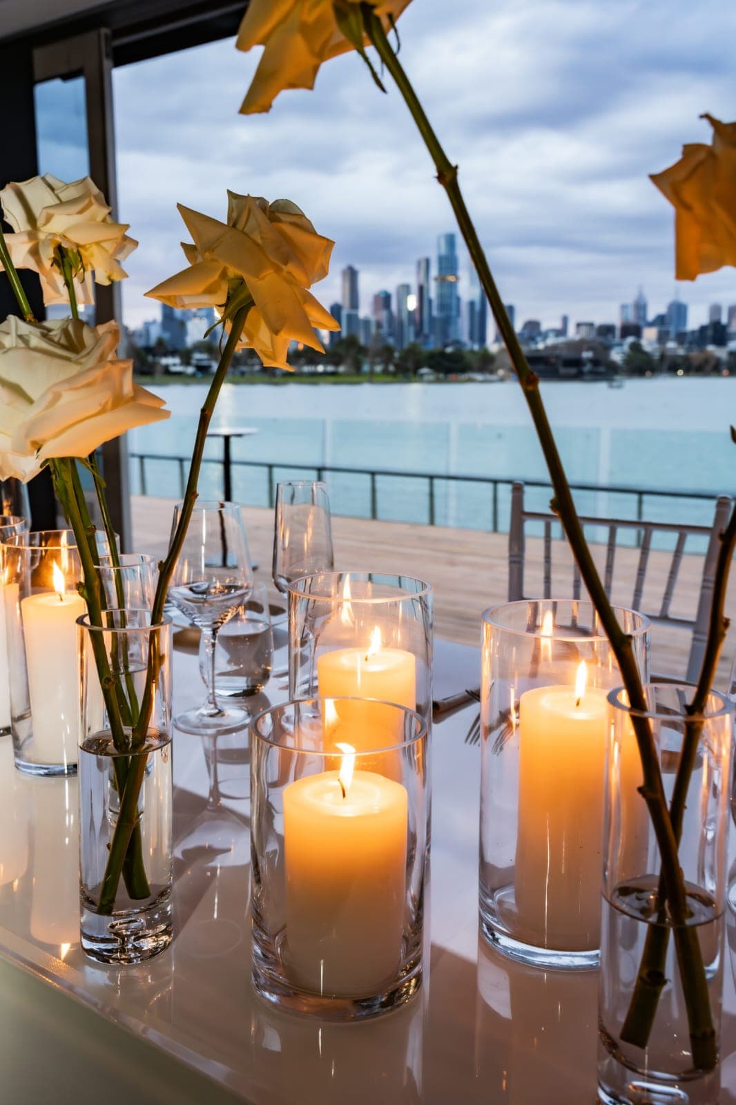 Waterfront candles at dusk